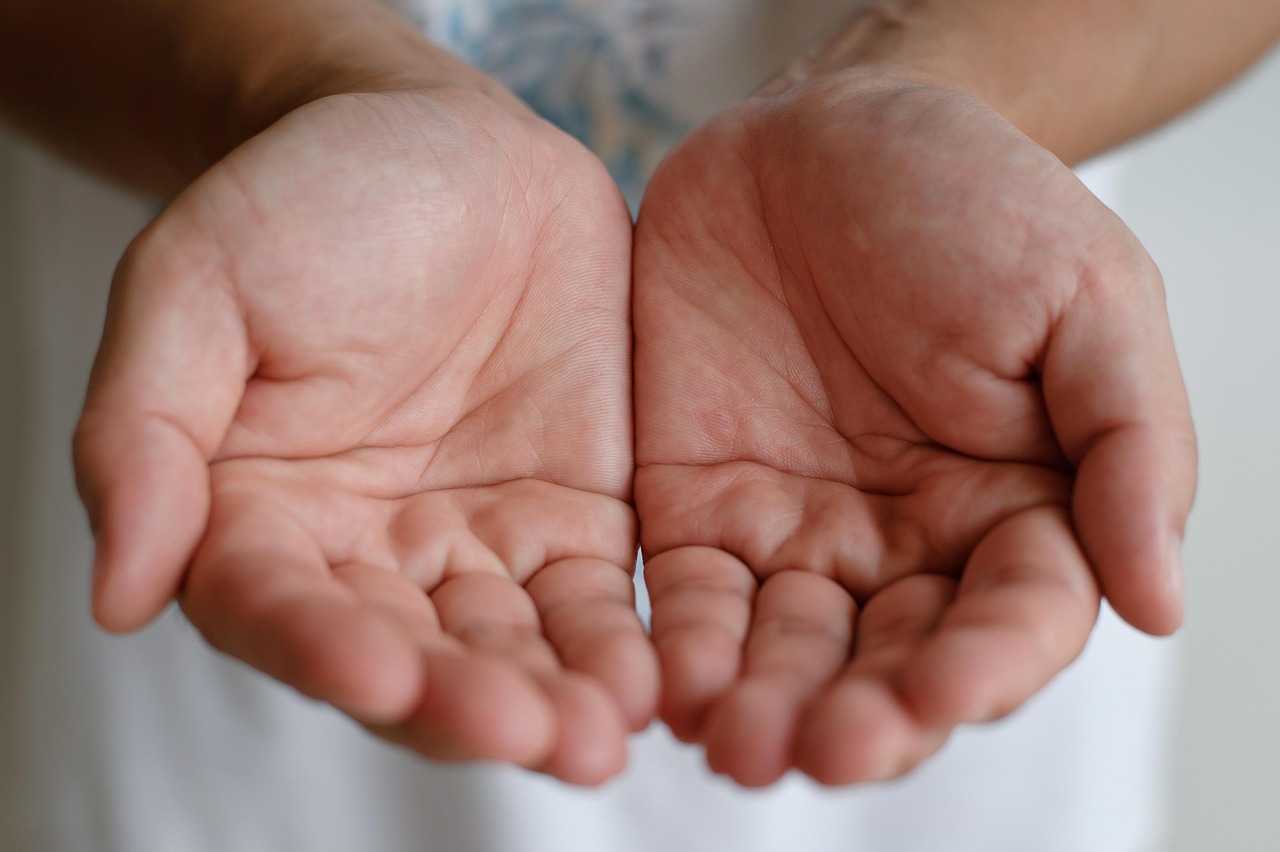 Close-up image of open human palms showing palm lines, illustrating what your palm lines say about you