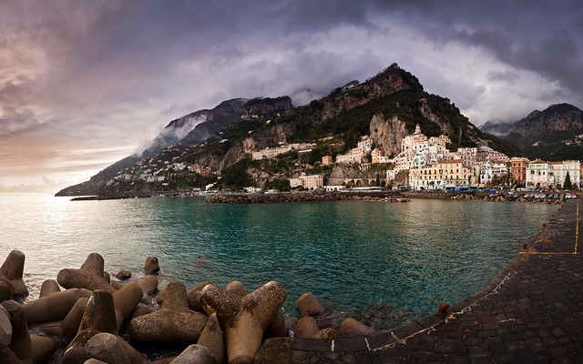 Most beautiful places in the world – picturesque seaside town on the Amalfi Coast with colorful buildings and rugged cliffs.