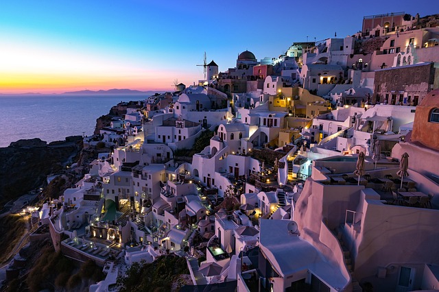 Santorini village in Greece glowing at sunset – one of the most beautiful places in the world
