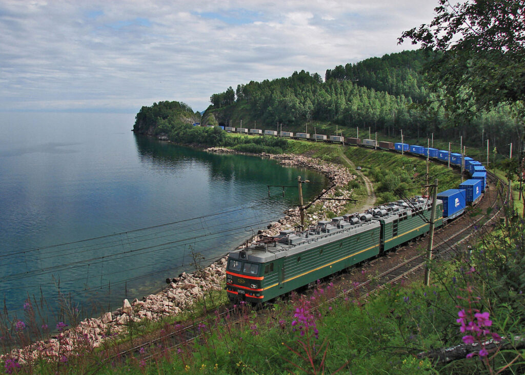 The Trans-Siberian Railway in Russia, one of the most scenic and longest train rides in the world, traveling through vast forests, snowy landscapes, and Lake Baikal.