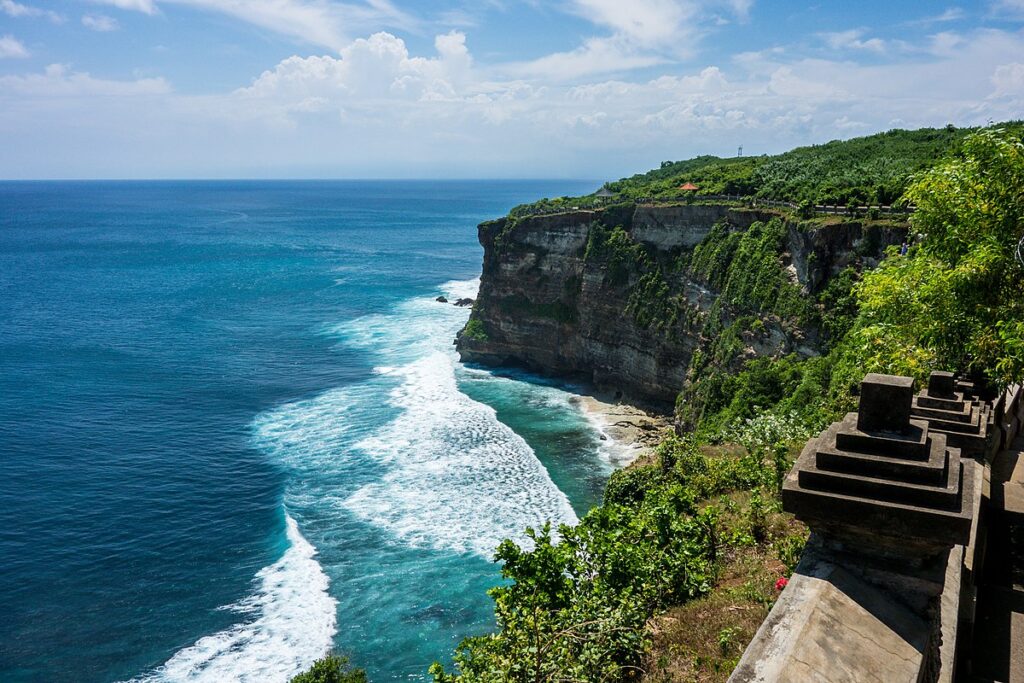 Beautiful view of Bali, Indonesia with lush rice terraces, tropical beaches, and temples, highlighting why it is one of the top tropical islands to visit for culture and adventure.